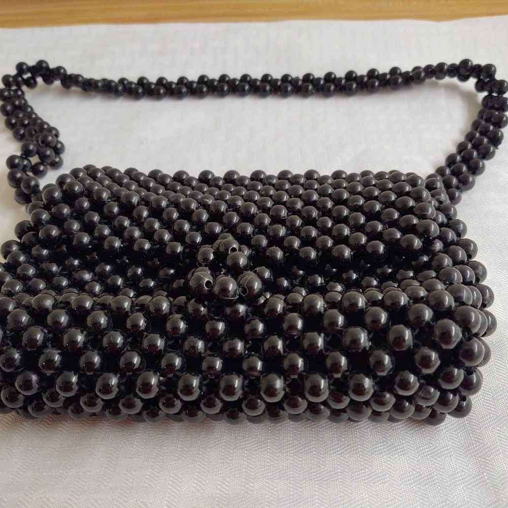 Vintage black beaded purse; Styled by Simon, Italy.